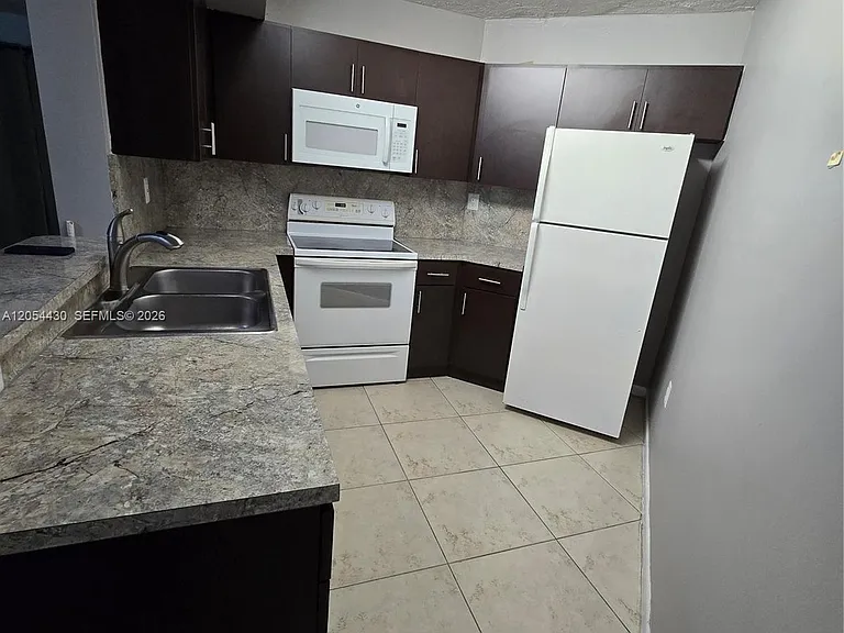 9731 Fontainebleau Blvd #F114 — Photo 6