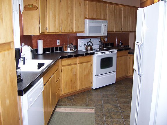 Kitchen is open to dining and living room