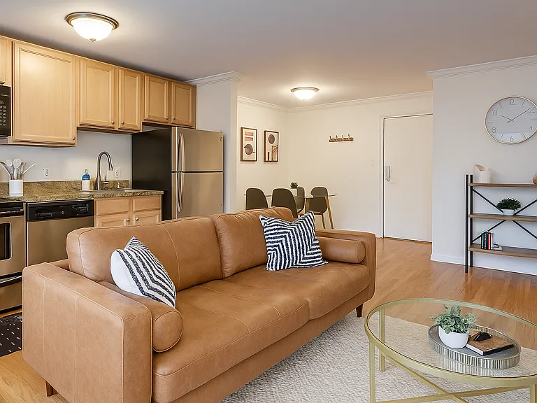 Open living/dining/kitchen area with a warm and inviting vibe