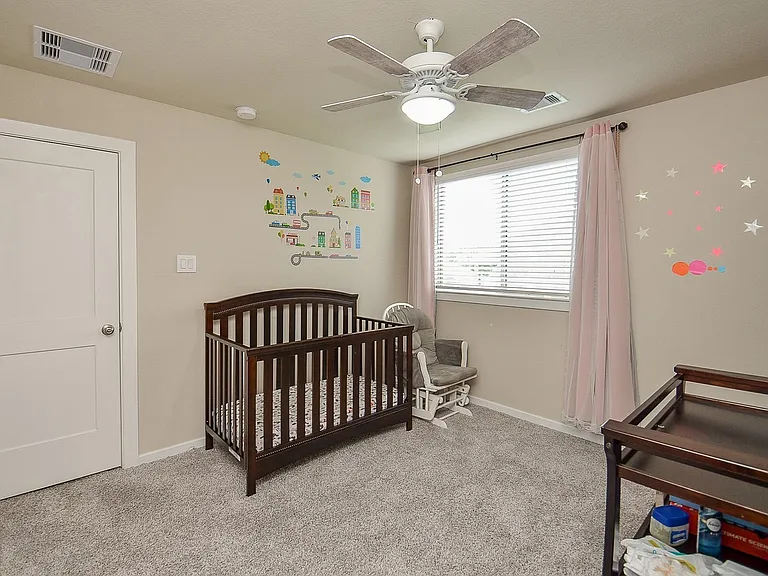 Second bedroom upstairs. Plenty of space and natural light.
