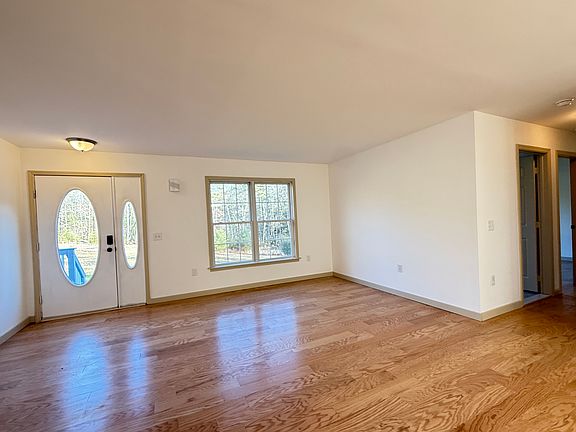 view from kitchen looking towards front entryway