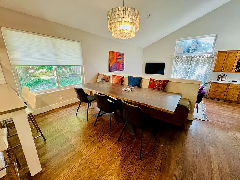 Dining are with custom bench and additional storage below.