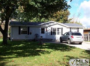 993 Carroll Dr, Clare, MI 48617