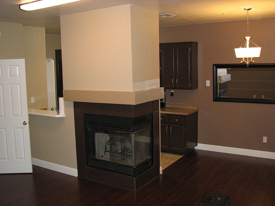Fireplace, kitchen, dining..
