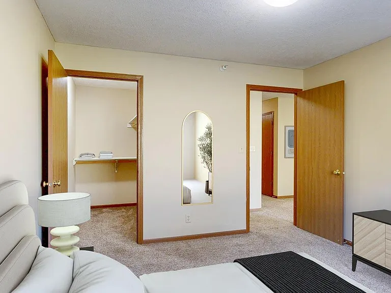 Spacious bedrooms include walk-in closets and thoughtful details that make everyday living feel a little more elevated.