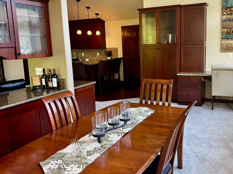 Dining room looking toward built in desk area and built-ins.