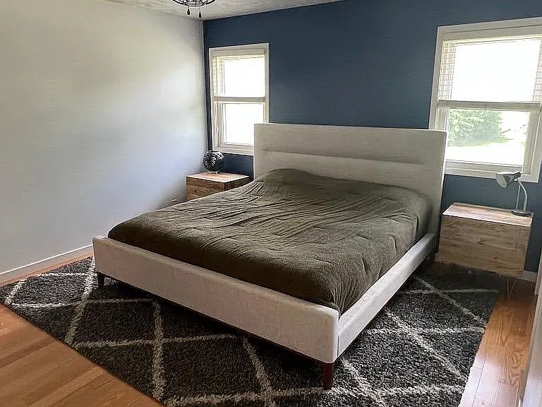 Master Bedroom with light filtering shades. Almost black out when shut, great for light sensitive sleepers!