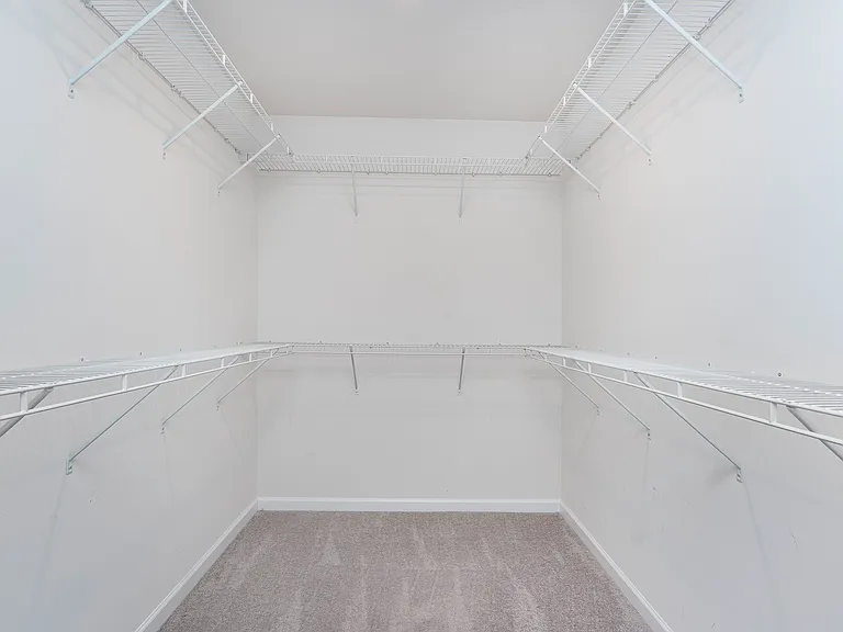 1 of the 2 large walk in closets in primary bedroom!!