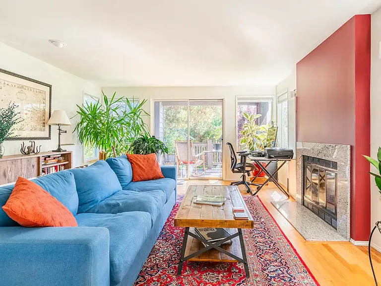 Wonderful living room with oversized couch and front deck