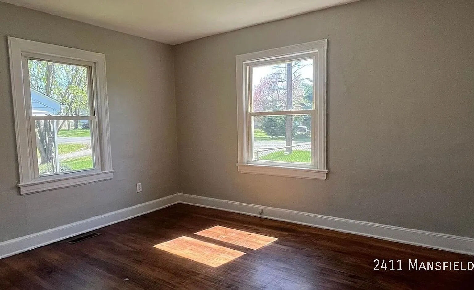 Charming 2-Bedroom Home with Hardwood Floors & Backyard — Photo 3