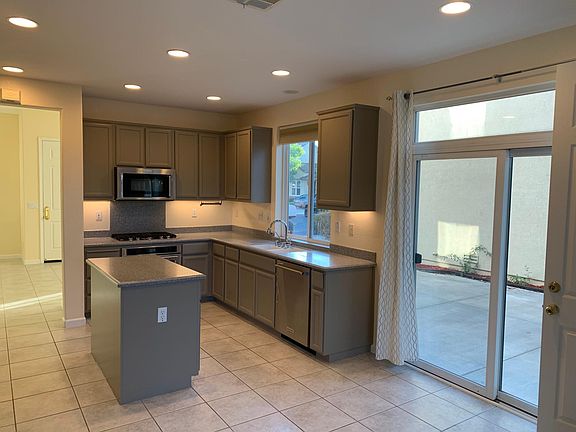 Kitchen with recently painted cabinets. Kitchenaid appliances