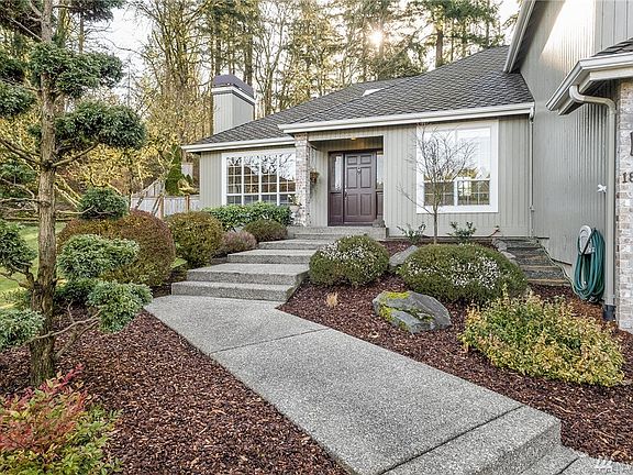 Come up the walkway, let's check out this cute home!