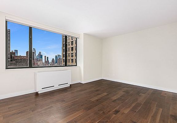 3rd image of 30 W 61st St APT 23B