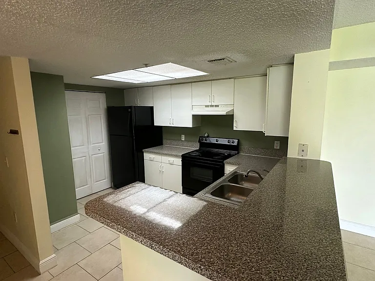 5005 Wiles Rd — Photo 19