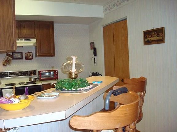 4th image of 3841 Northwoods Ct NE Unit 1