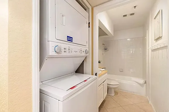 Your stacked washer and dryer in the condo. Each floor has a laundry room with high capacity machines as well.