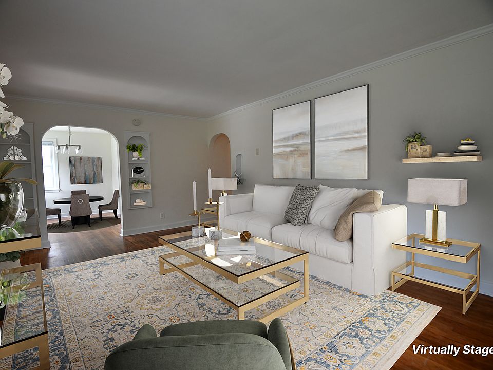 This is a view of the Living Room and the Dining Room from in front of the Living Room Window.