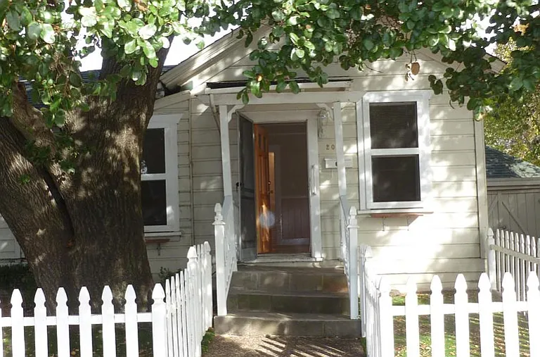 Entrance to the cottage on Sixth Street with private front yard.
