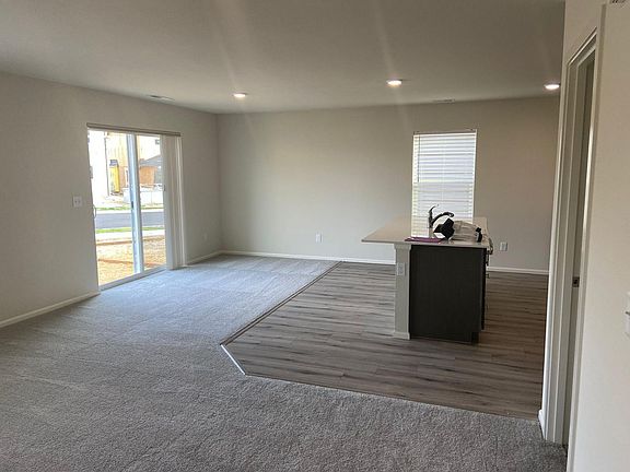 Downstairs living room with island for sink & diswasher