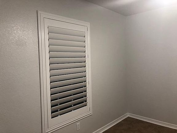 Bedroom with plantation shutters