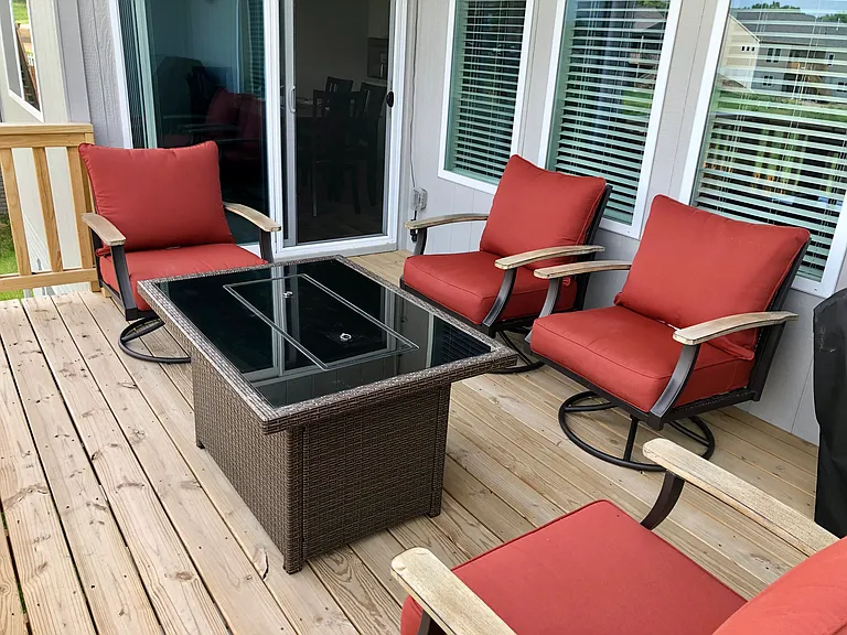 Deck chairs, firetable, and grill