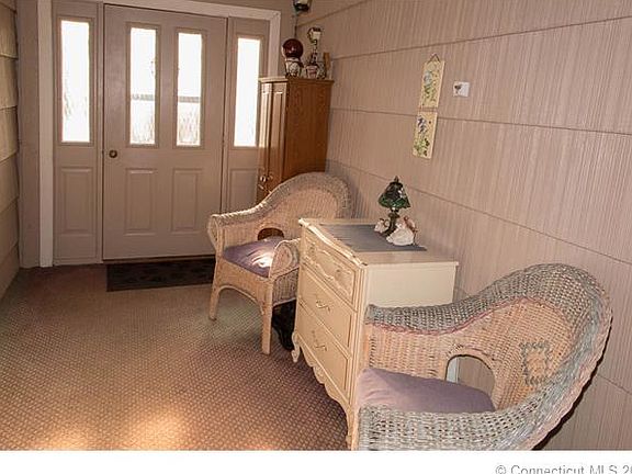 Enclosed porch running from...