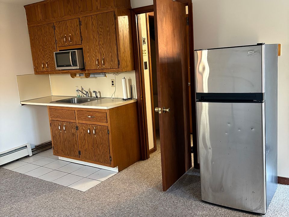 Kitchen with full size refrigerator