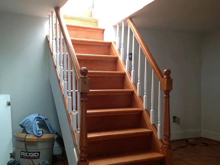 Stairs from loft leading to rooftop deck