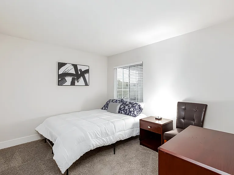 Bedroom, nightstand, full closet, work space and dresser
