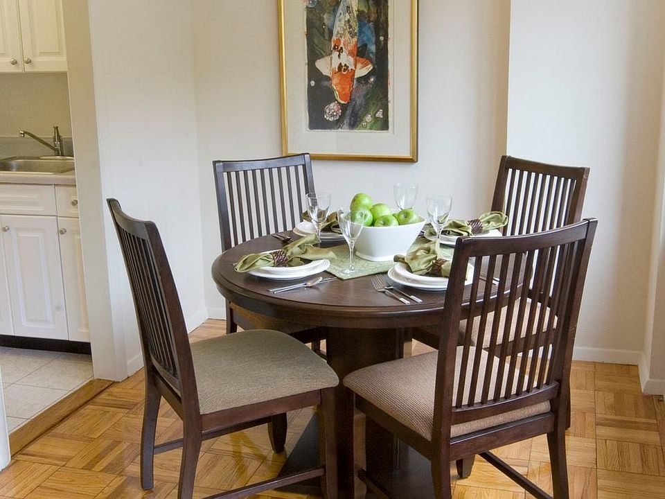 Dining area with parquet flooring