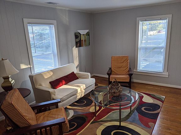 Two large windows in Living Room to front and side street.
