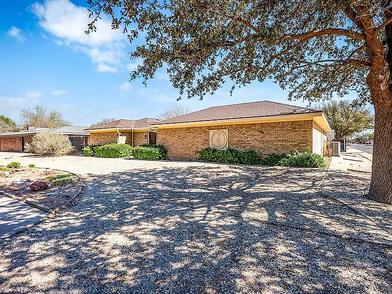 front of house from angle - 4300 Boulder Dr