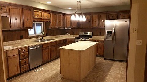 The large kitchen has been remodeled.  The range, refrigerator and built-in dishwasher are included.