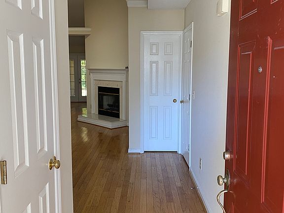 Entry with closet, bathroom, and garage doors