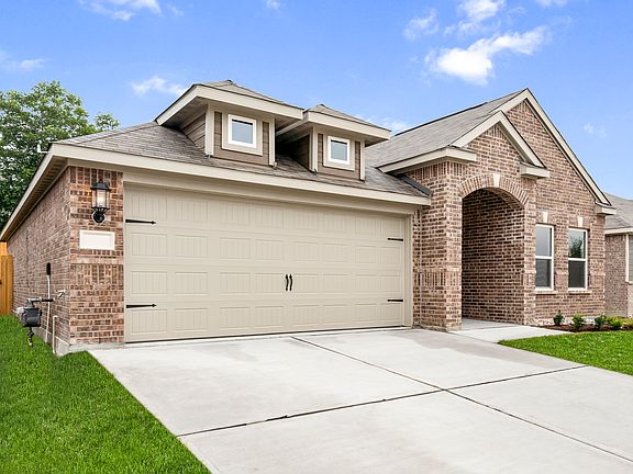 The front yard of the Erie has front yard landscaping.