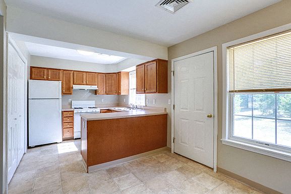 3 Bedroom Unit - Kitchen and Dining Area - All Appliances Included