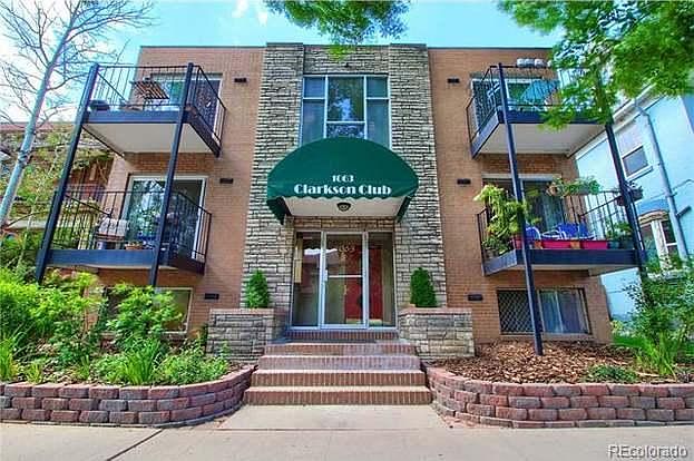 Front of Building (Unit is top floor on the left with balcony).