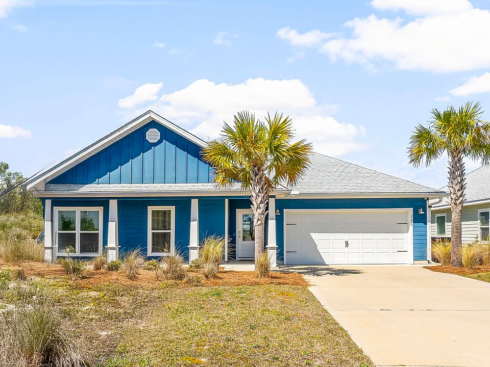 This beach home is located in the heart of Windmark Community