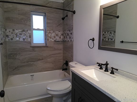Marble and tile bath.