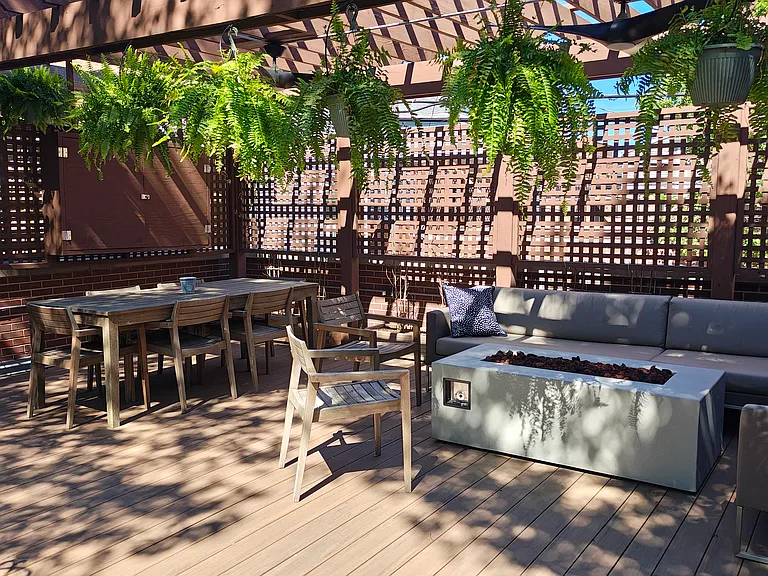 Deck above the garage. This deck technically belongs to the owners' unit, but tenants can use it to grill, sit out and enjoy the weather, etc. If hosting a small group of friends, just coordinate with owner and other tenants.
