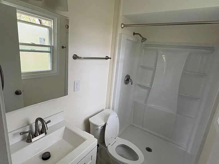Master Bathroom - Full View (includes medicine cabinet for extra storage) - fully remodeled with Moen shower fixtures