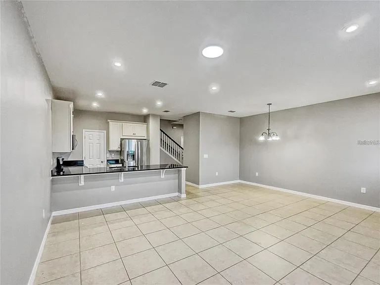 2424 Blowing Breeze Ave — Photo 3