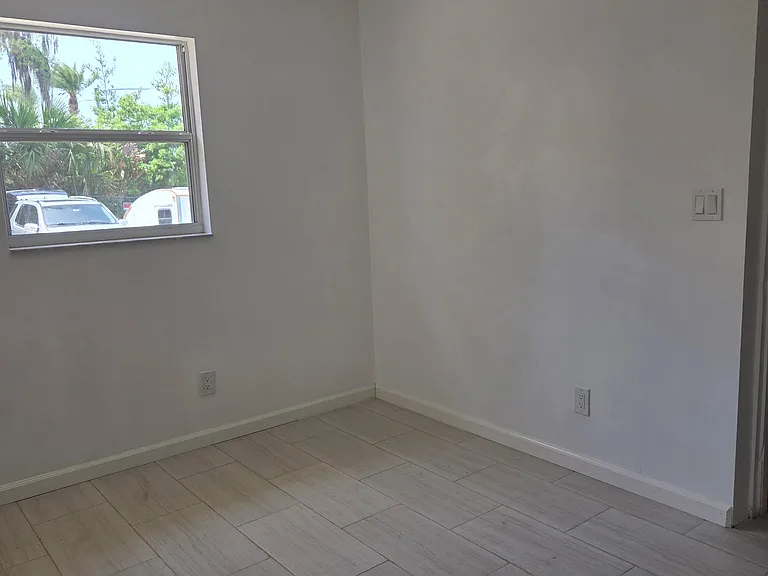 laundry room, can be used for office space, beautiful tile floors