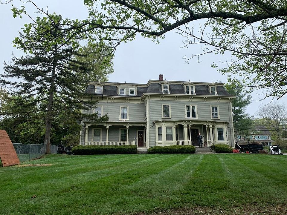Front yard view of house. Door on left is unit #1 private entrance and porch.