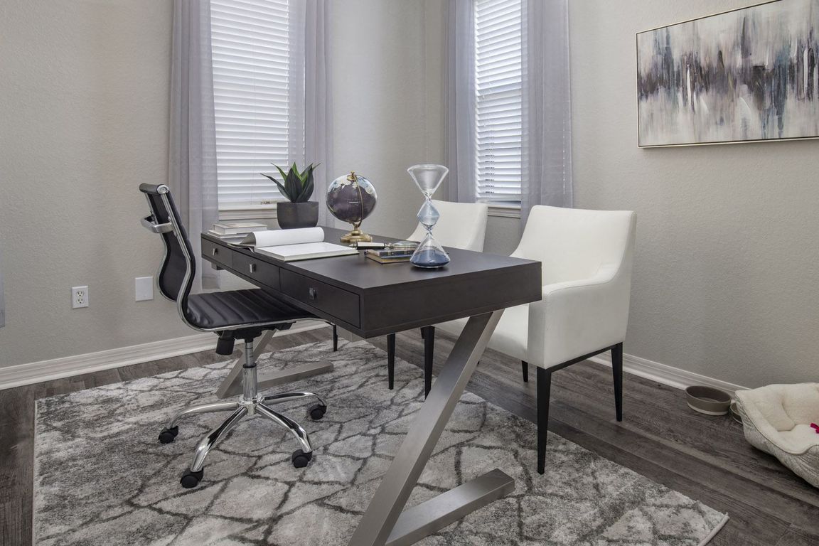 Private Study with Desk, Office Chair, and Cozy Decor