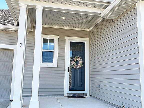 Triple lock storm door
