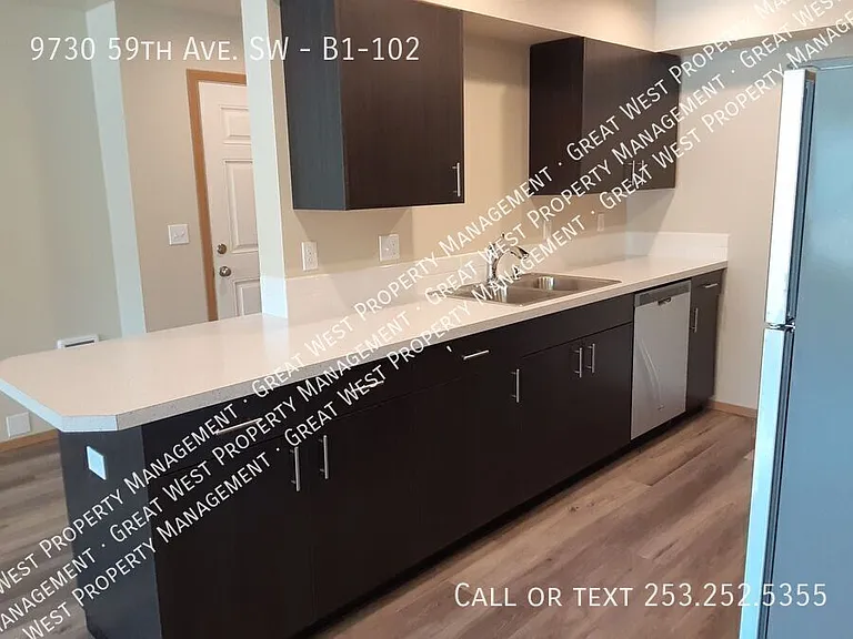 9730 59th Ave SW #B1-102 — Photo 1
