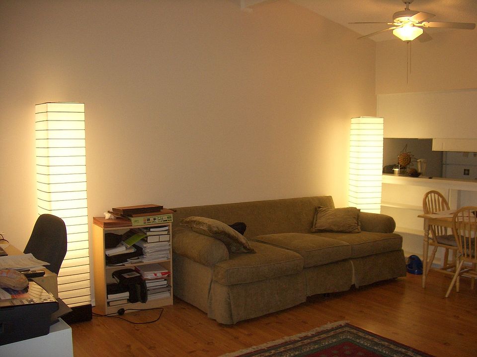 Spacious living area with vaulted ceiling.