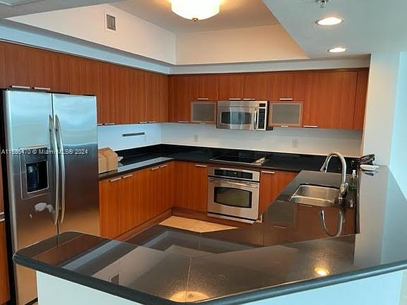 2nd image of 14951 Royal Oaks Ln APT 2501