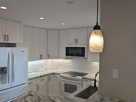 Granite countertops (in kitchen and bathrooms)